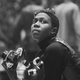 Political and social activist and Black Panther member Afeni Shakur looks up while photographing the scene during a rally in support of the Panther 21 in New York City on April 4, 1970.
David Fenton/Getty Images